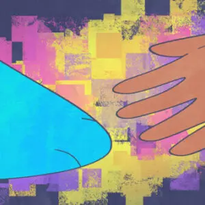 A close up of two hands touching one another