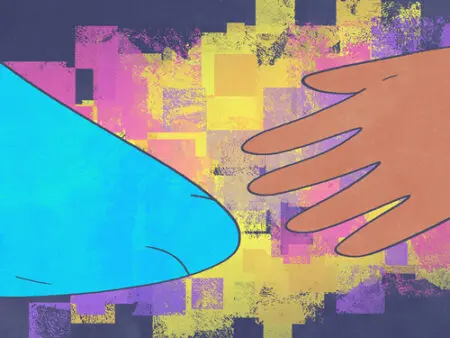 A close up of two hands touching one another