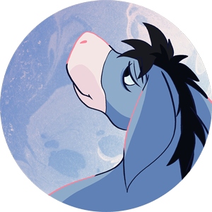 A close up of the face of eeyore