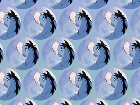 A pattern of eeyore with a hat on.