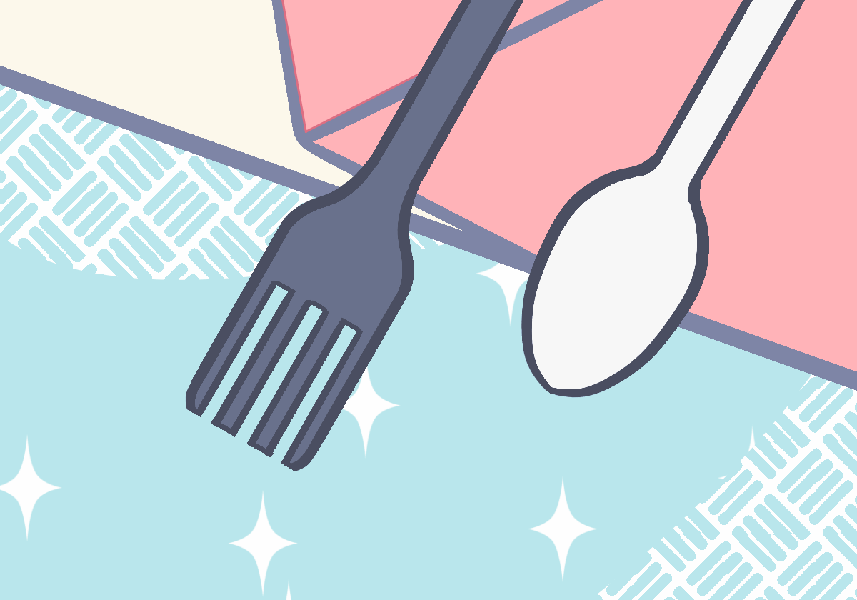 Fork and spoon on colorful geometric background.